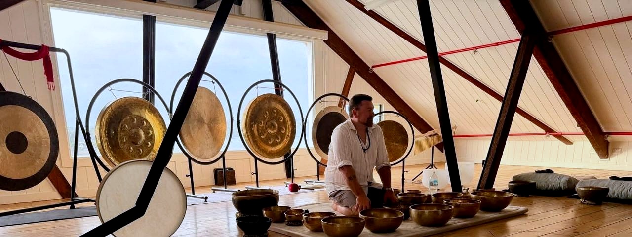 Luke Collins with Gongs and Singing Bowls in Studio