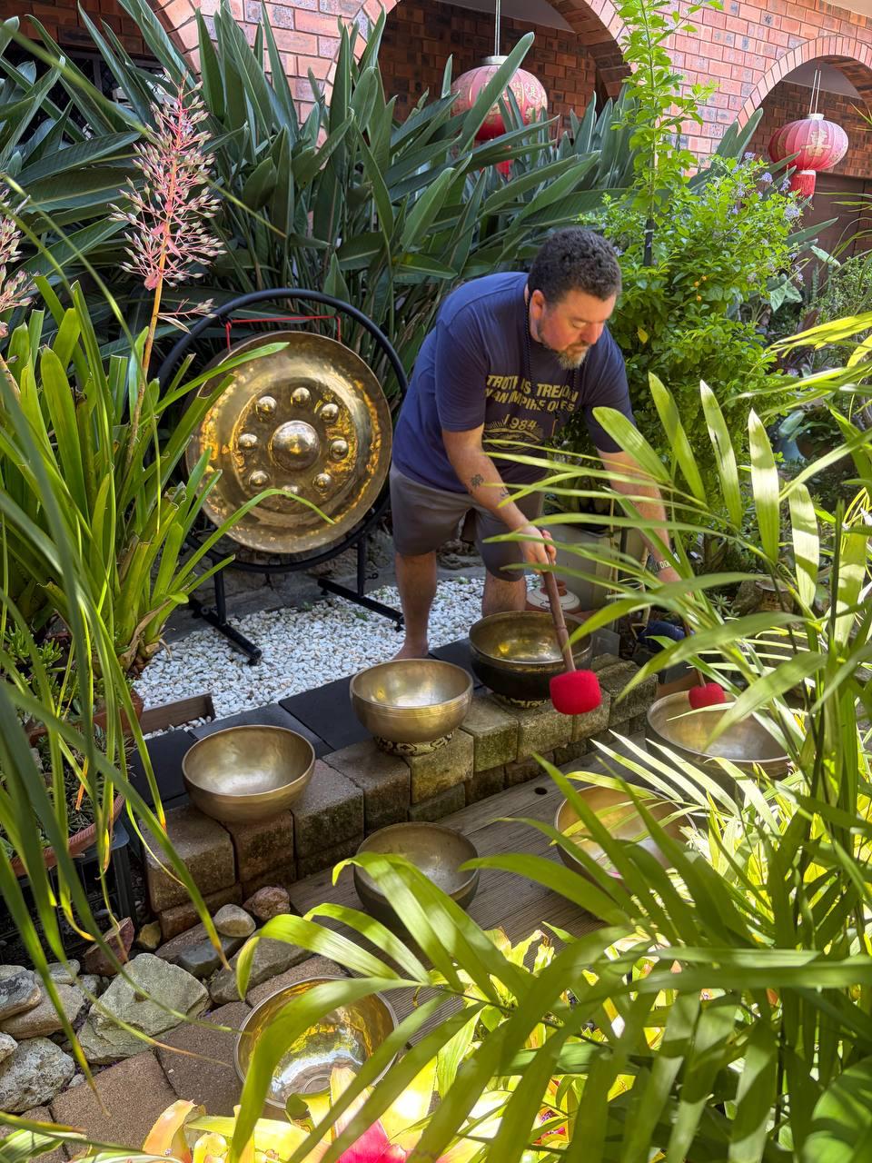 Luke with singing bowls